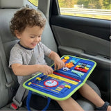 Child exploring a blue busy board activity book while seated in a car