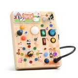 Farm-themed wooden LED busy board with switches, knobs and colorful lights